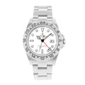 Silver watch with a white face on a white background