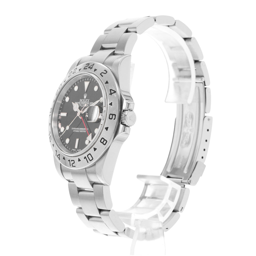 Silver watch with a black dial on a white background